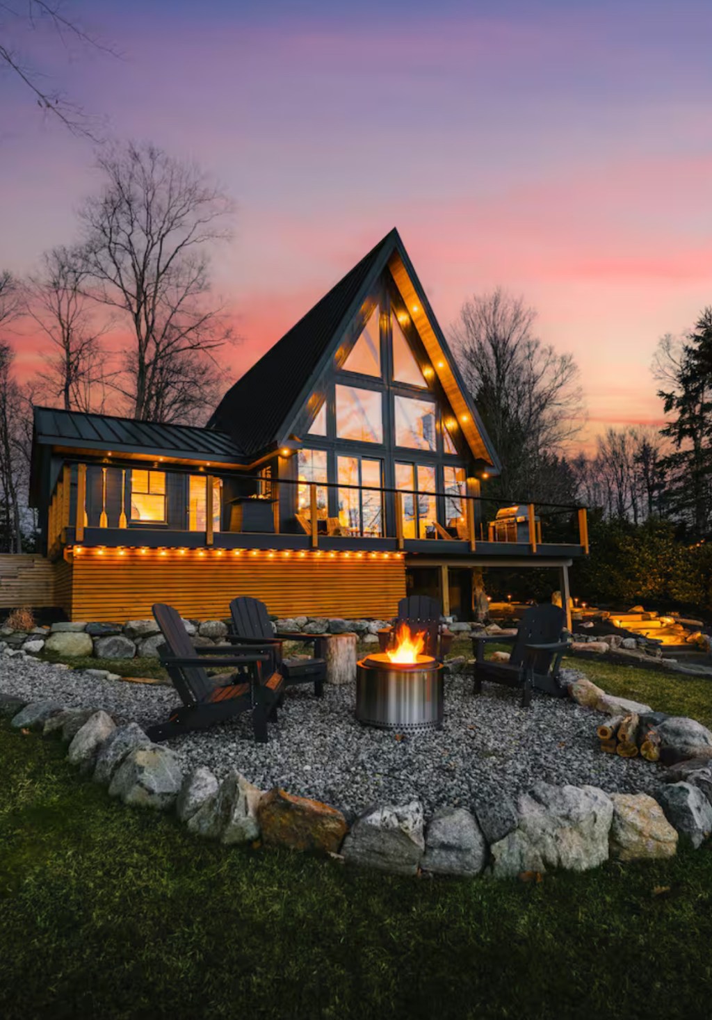 Sunset Cove A-frame at sunset with fire pit